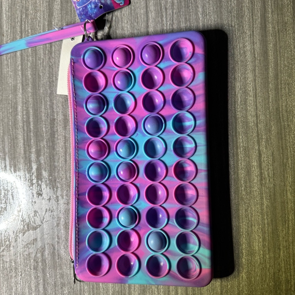 Pop it lot. One zippered pencil case, one zippered coin purse.